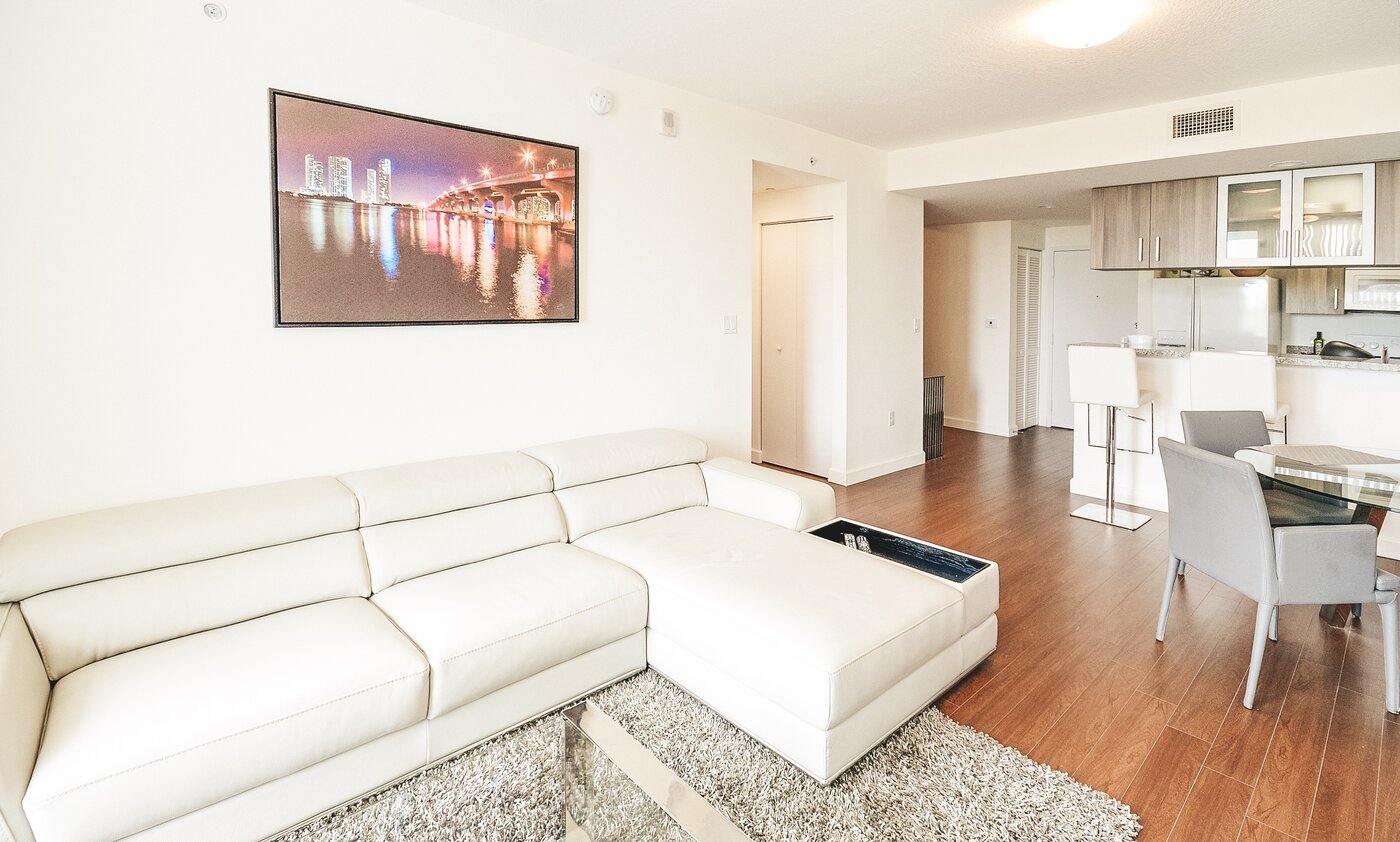 Spacious living room with hardwood floors